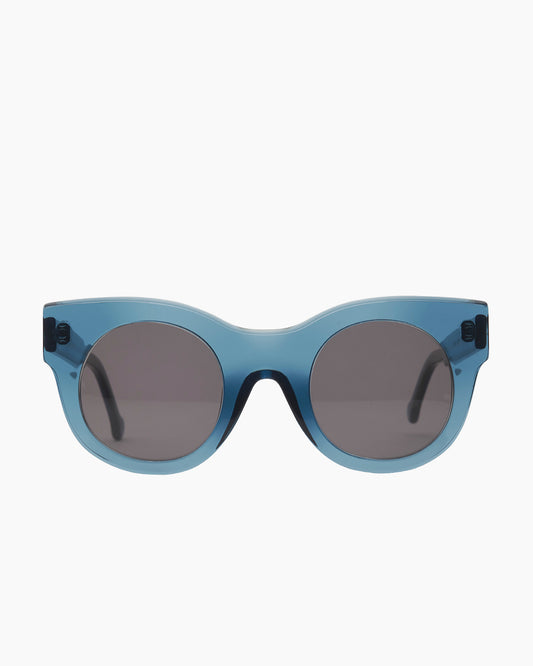 blue plastic round  sunglassesby Marie-Sophie Dion model BrixiSun, front view, lunettes de vue rond couleur Bleu