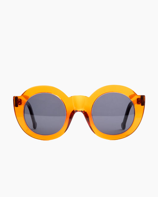 orange plastic round  sunglassesby Marie-Sophie Dion model CollSun, front view, lunettes de vue rond couleur Orange