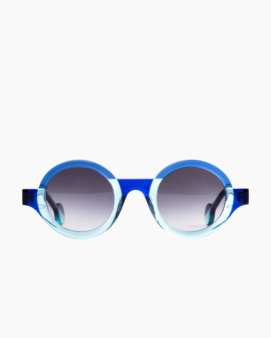 blue plastic round sunglassesby theo model Kubisme, front view, lunettes de vue rond couleur bleu
